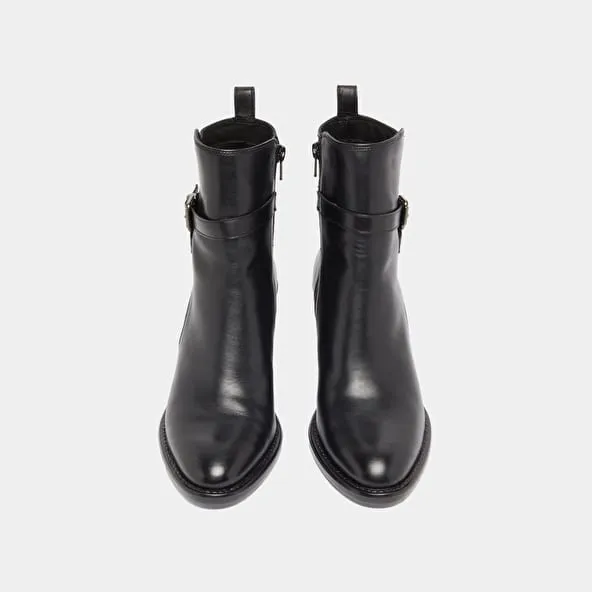 Heeled ankle boots and buckles in black leather