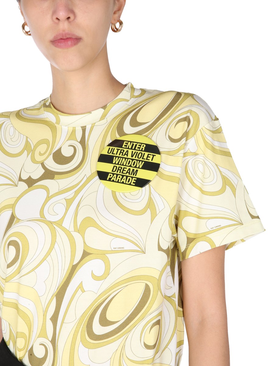 RAF SIMONS      T-SHIRT GIROCOLLO CON STAMPA ALLOVER