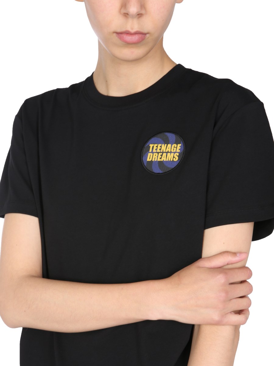 RAF SIMONS      T-SHIRT GIROCOLLO IN JERSEY DI COTONE CON PATCH TEENAGE DREAMS